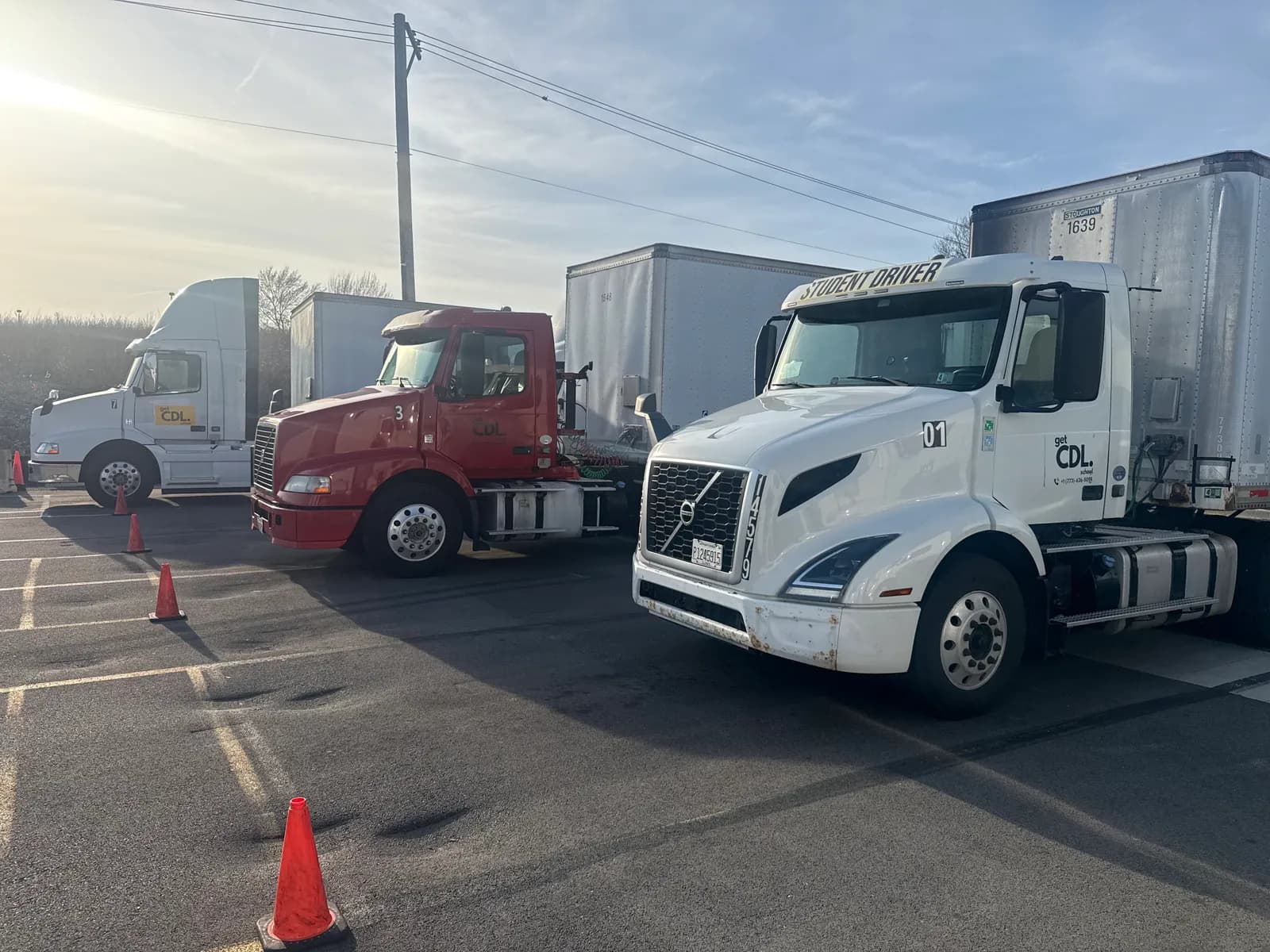 GetCDL School training trucks including a student driver vehicle