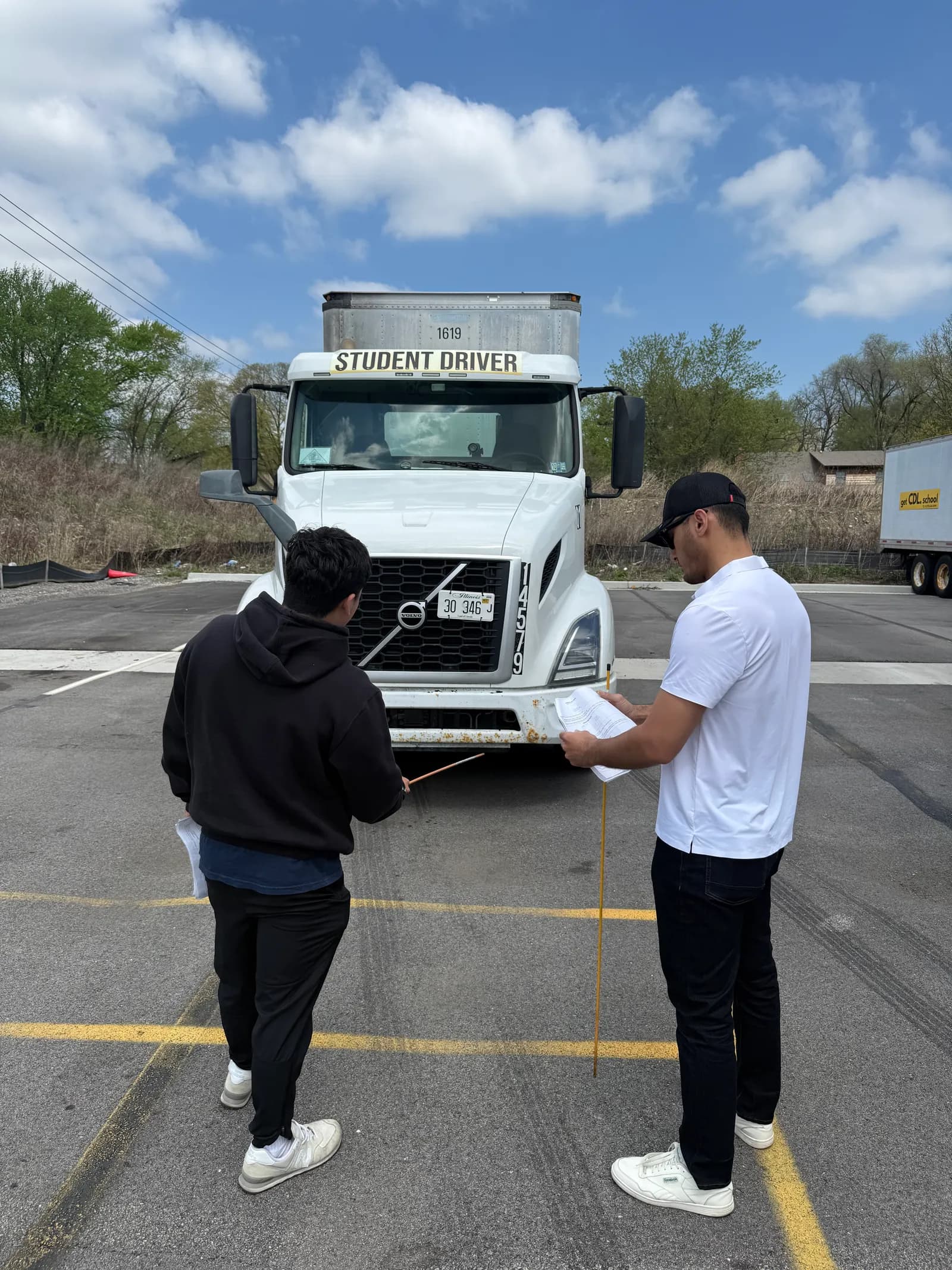 Students performing a pre-trip inspection at GetCDL School