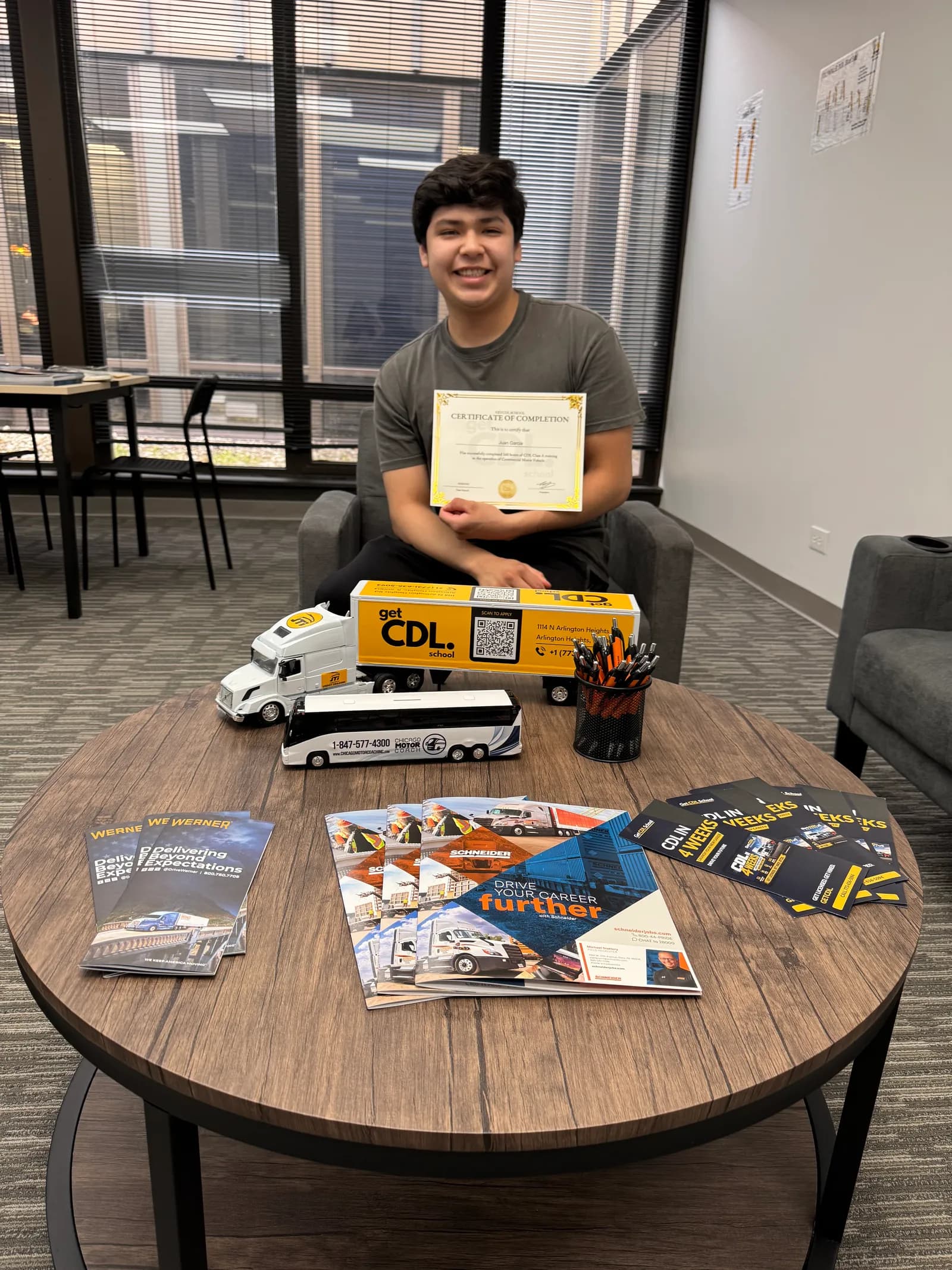 GetCDL School graduate with a certificate of completion